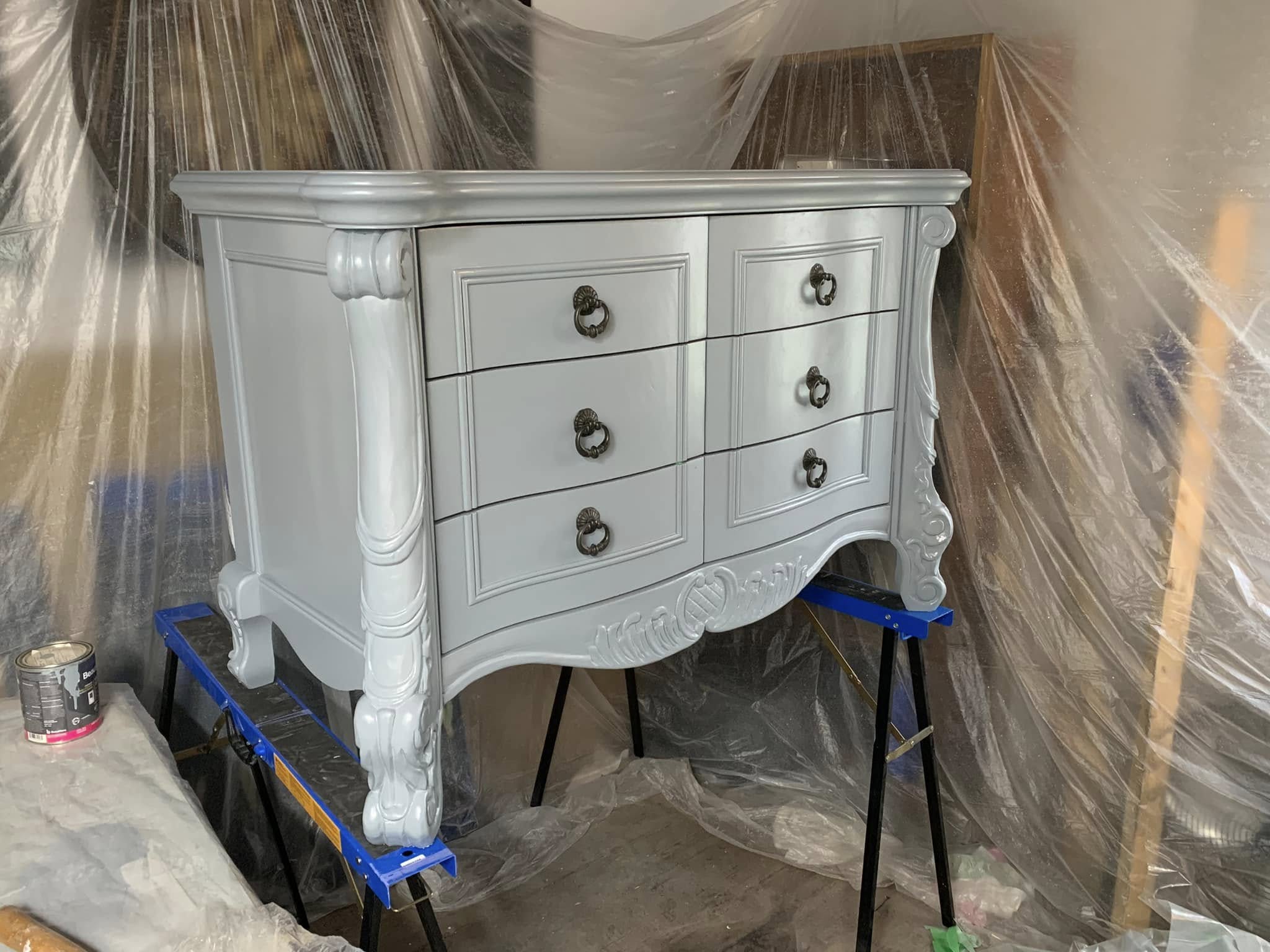 Ornately carved dresser refinished in a soft dove-grey finish