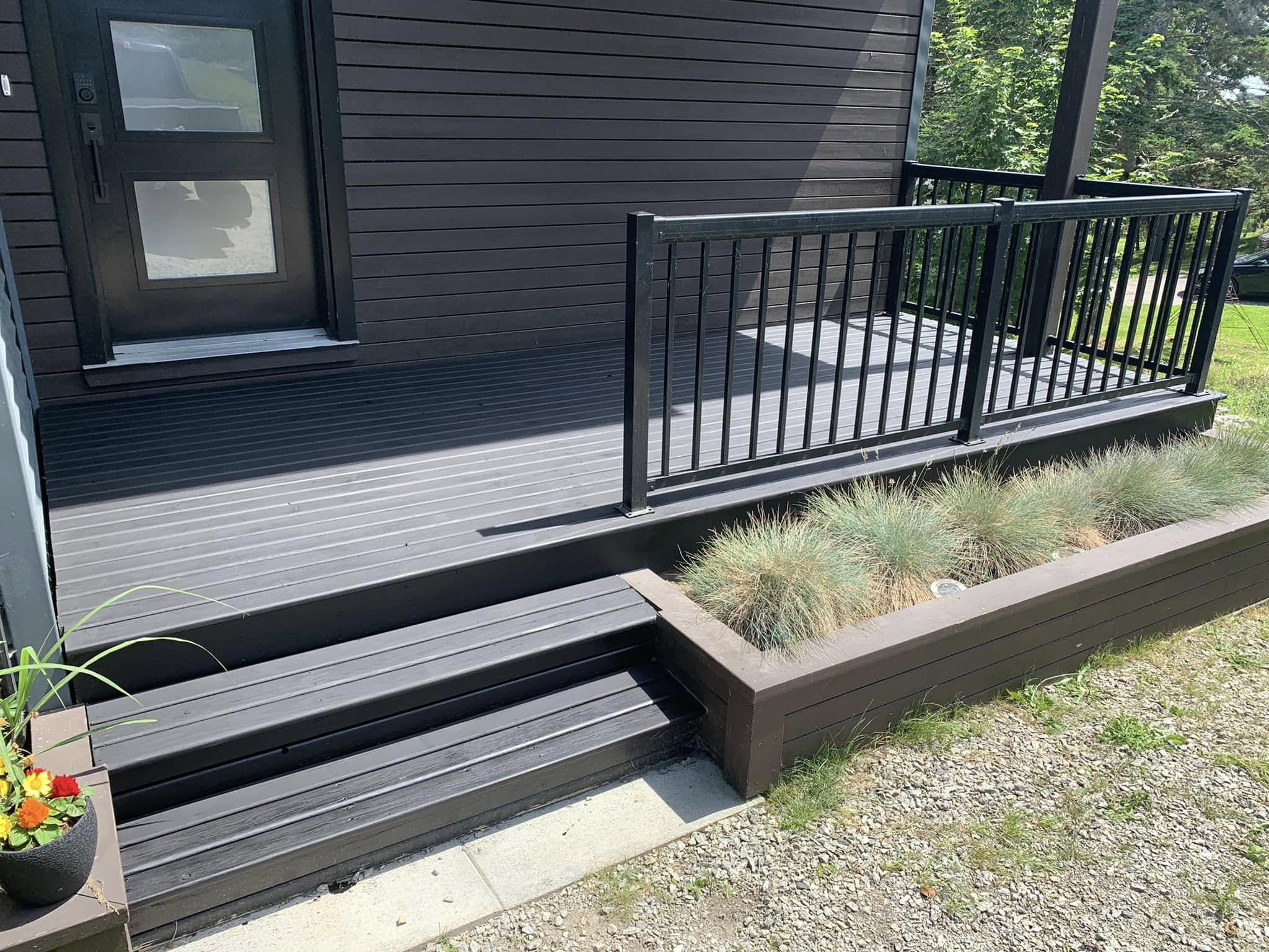 Deck restained in a rich charcoal finish